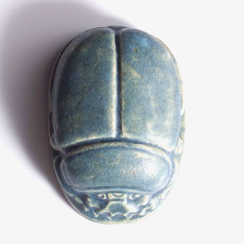 Appraisal: GRUEBY Large scarab paperweight covered in mottled blue-green glaze Restoration