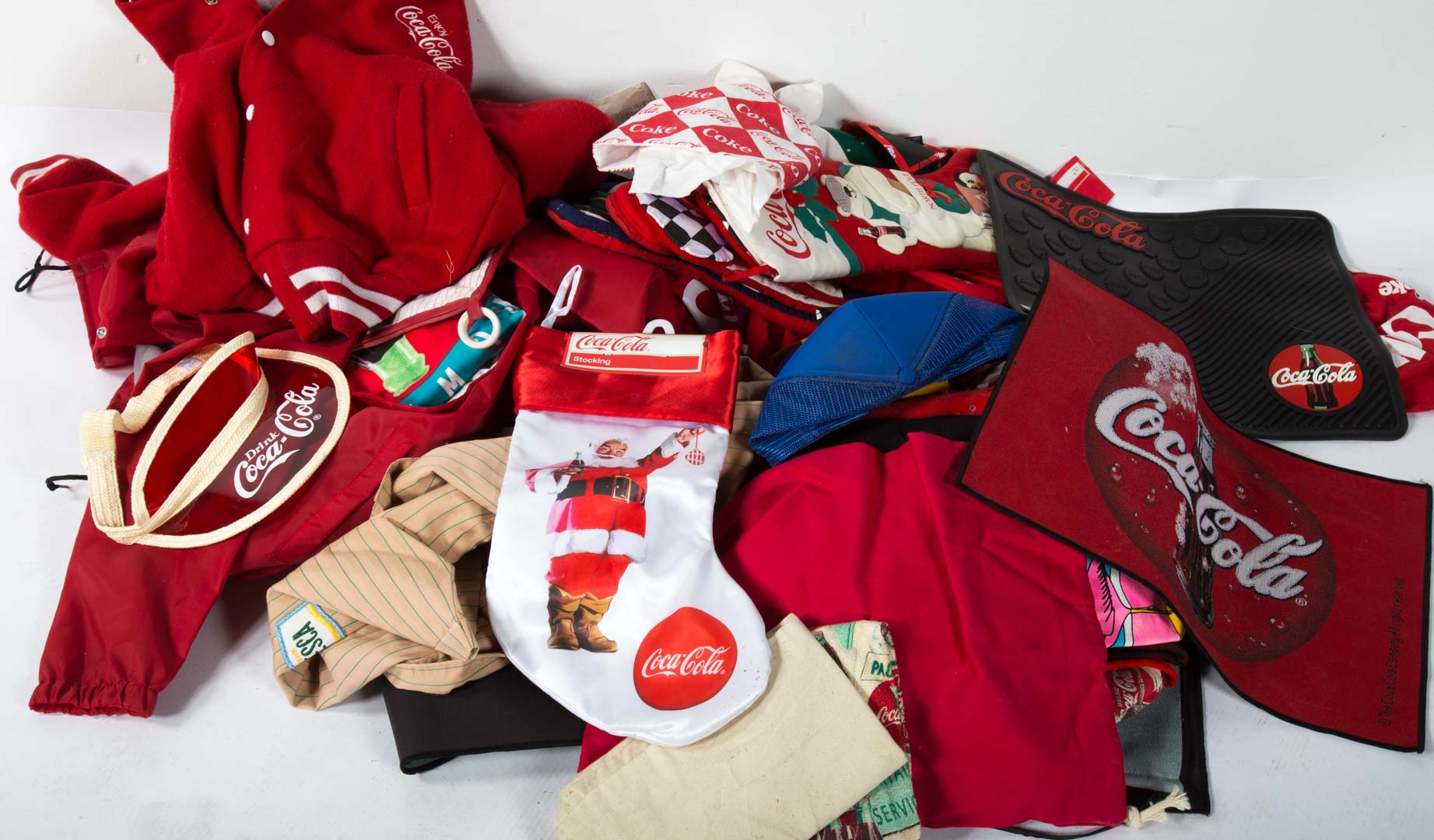 Appraisal: Large lot of Coca-Cola textiles and pillows Undernumber