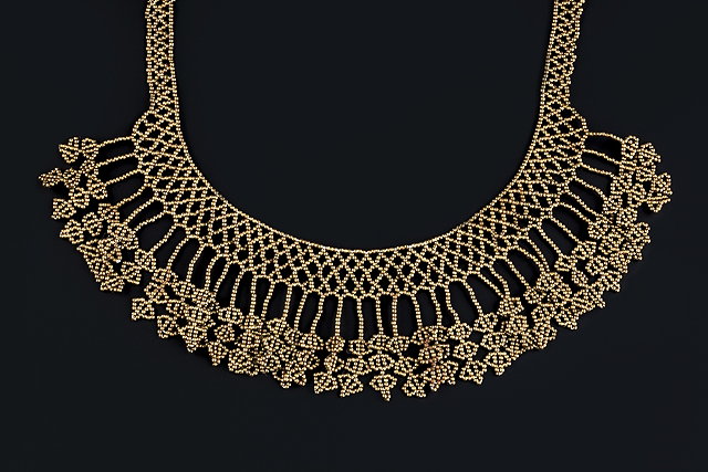 Appraisal: An antique fringe necklace of gilt beaded lattice work design