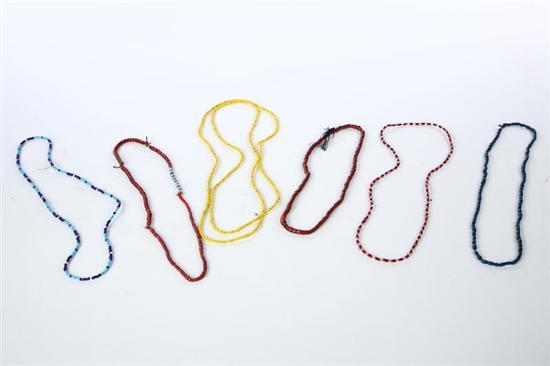 Appraisal: SIX STRINGS OF TRADE BEADS Three strands are attributed to