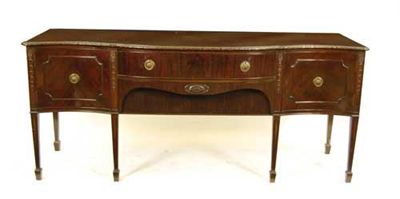 Appraisal: A mahogany serpentine front sideboard by Waring Gillows with a