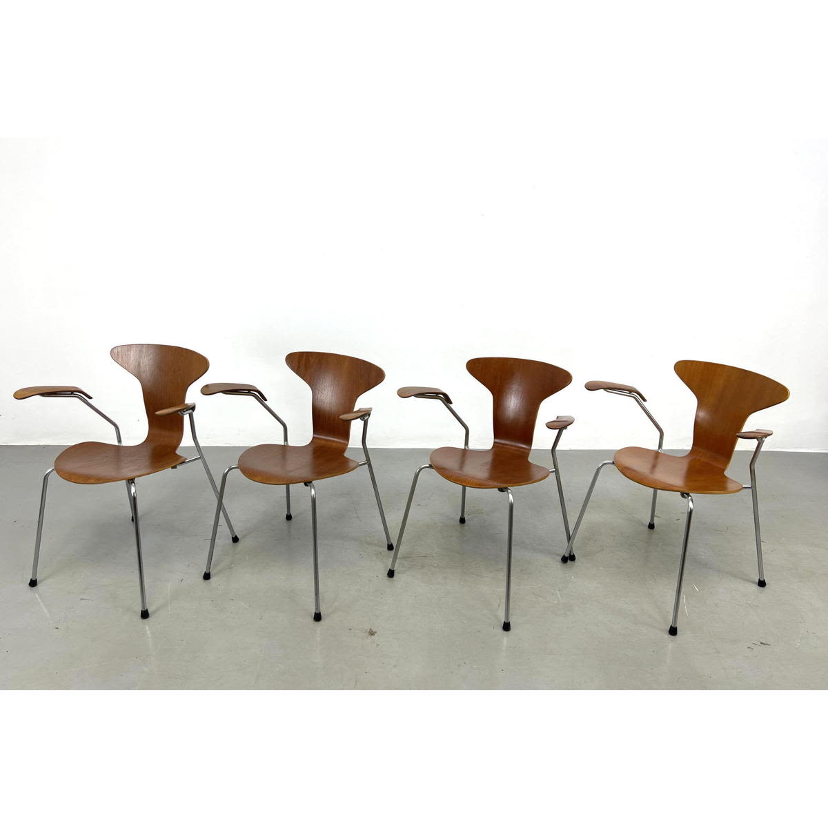 Appraisal: Set Early Arne Jacobsen Arm Chairs Model Nickel-plated tubular steel