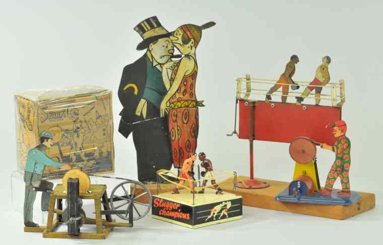 Appraisal: GROUPING OF TIN TOYS FIGURES Assorted lot includes Boxers at