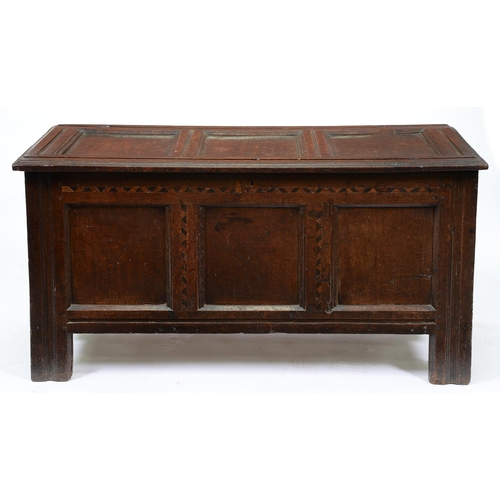 Appraisal: A Charles II oak chest with three panel lid and