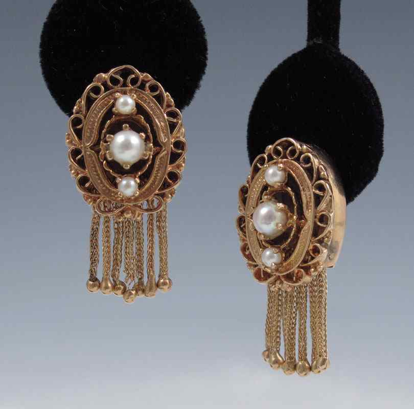 Appraisal: K ETRUSCAN STYLE EARRINGS Oval yellow gold clip earrings in