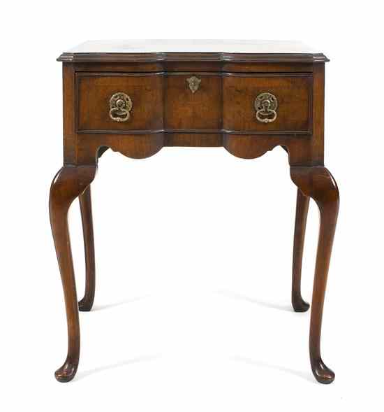 Appraisal: A Queen Ann Style Mahogany Diminutive Lowboy having a rectangular