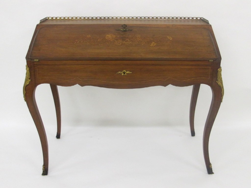 Appraisal: A Louis XV style rosewood ladies bureau the pierced brass