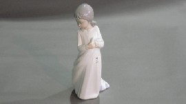 Appraisal: Nao Figure of a girl in a nightdress