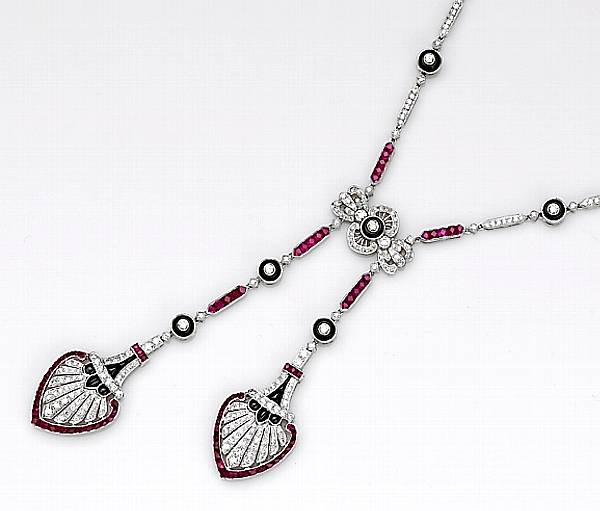 Appraisal: A ruby diamond and black onyx necklace estimated total ruby