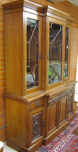 Appraisal: GEORGE III STYLE MAHOGANY BREAKFRONT DISPLAY CABINET ON CABINET English