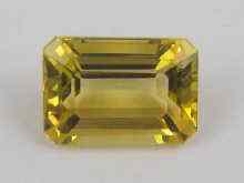 Appraisal: A loose polished citrine of vivid yellow colour measuring approx