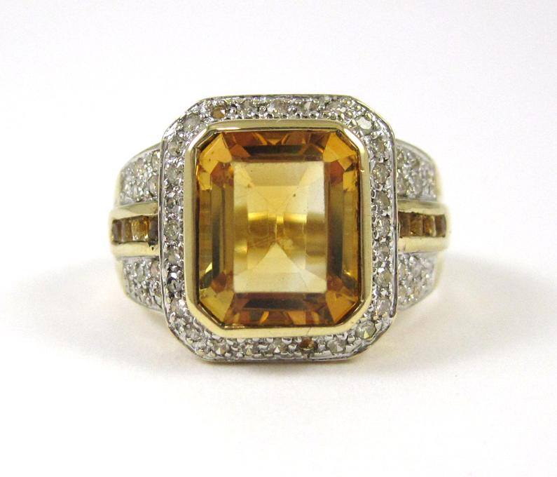 Appraisal: CITRINE DIAMOND AND TEN KARAT GOLD RING The k yellow