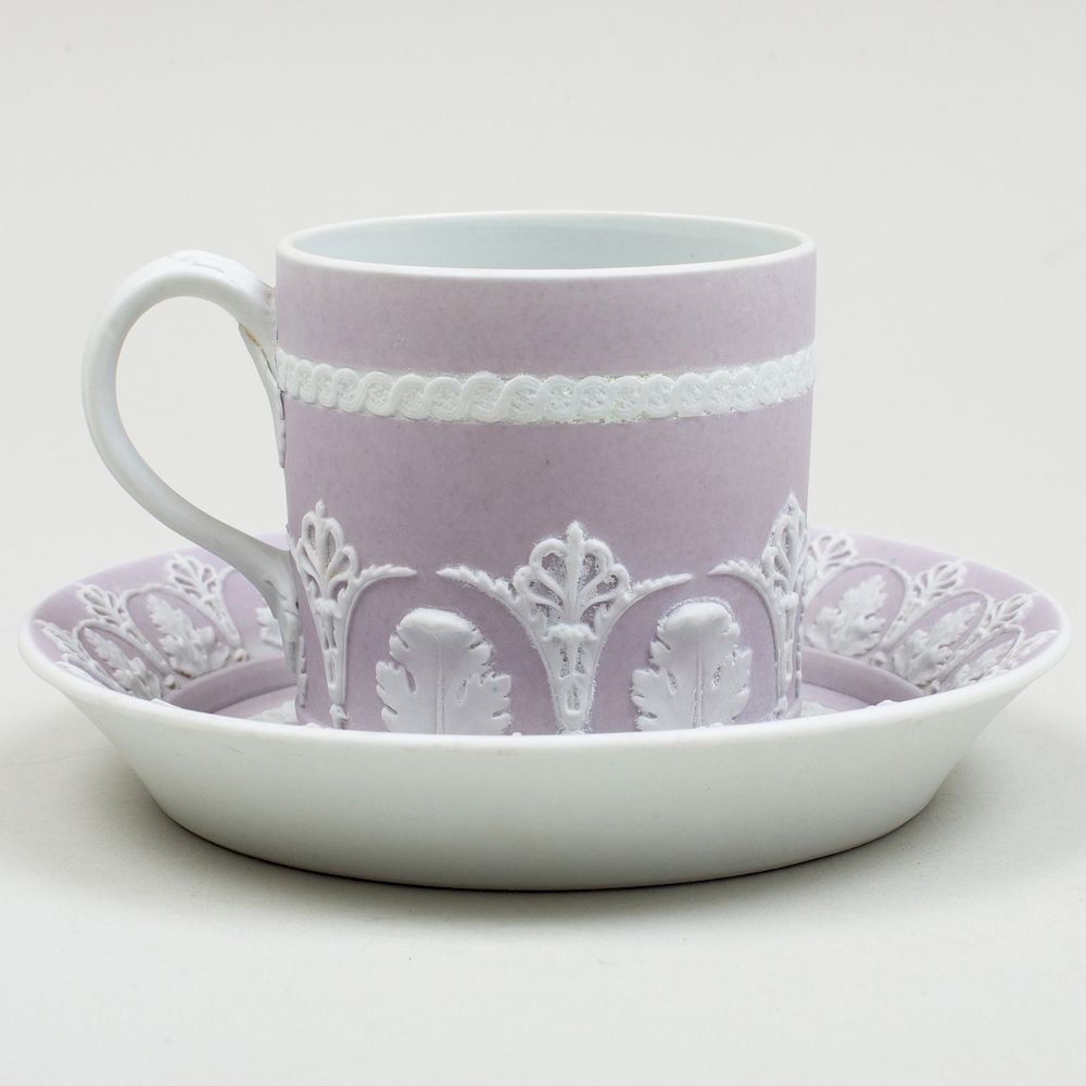 Appraisal: Wedgwood Lilac Jasperware Coffee Can and Saucer Impressed mark decorated