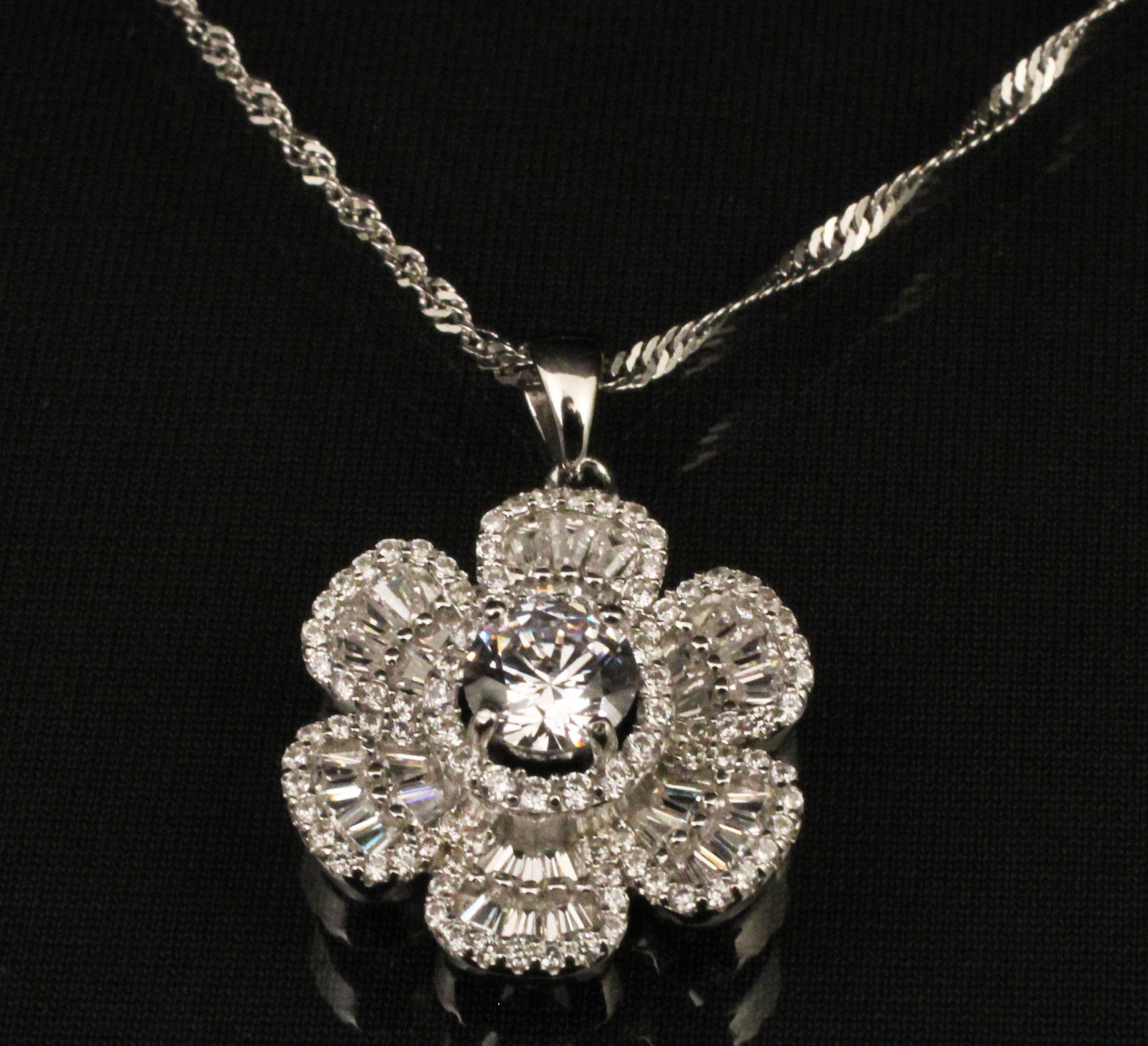 Appraisal: STERLING SILVER AND FAUX DIAMOND PENDANT NECKLACE Sterling silver faux