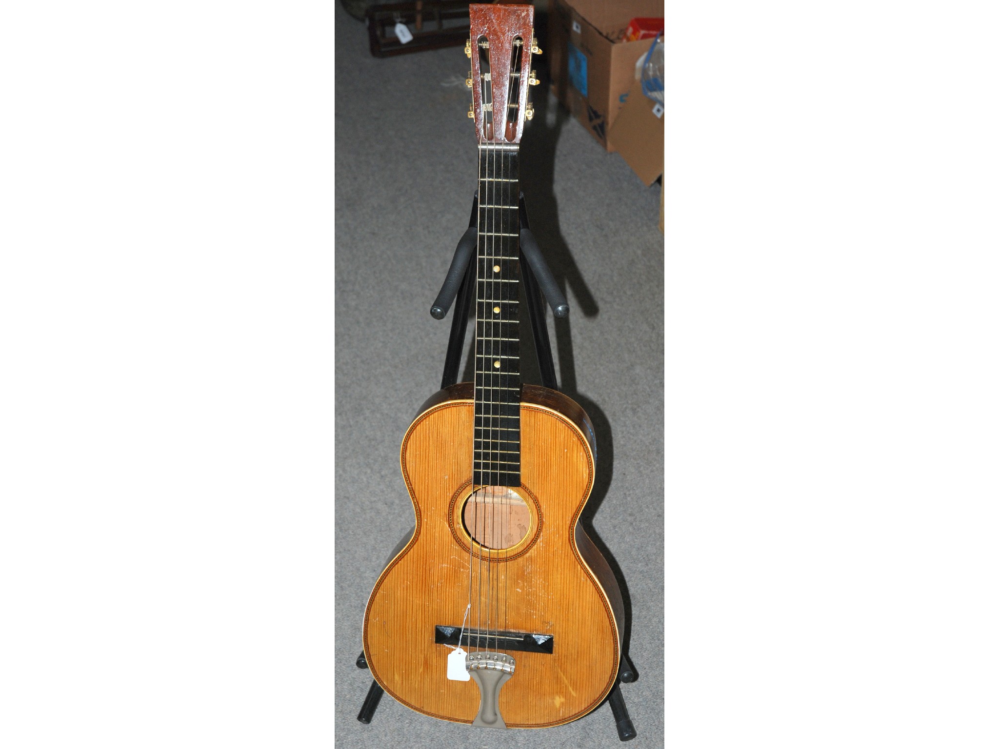 Appraisal: An acoustic guitar with attached Waldorf label