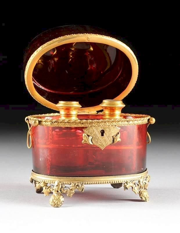 Appraisal: A BOHEMIAN RUBY GLASS FITTED PERFUME CASKET CIRCA A BOHEMIAN