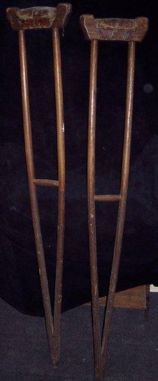 Appraisal: A pair of oak crutches cm high