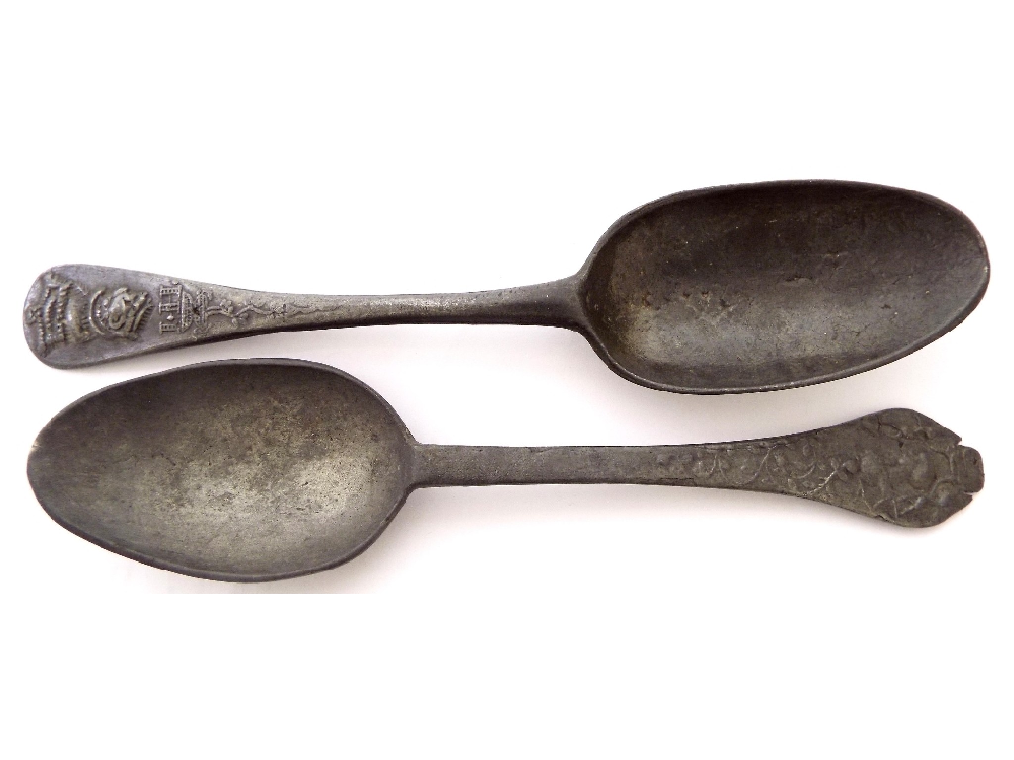 Appraisal: th century relief pewter spoon with cast relief of Queen