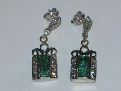 Appraisal: A PAIR OF EMERALD AND DIAMOND EARRINGS the oblong panels