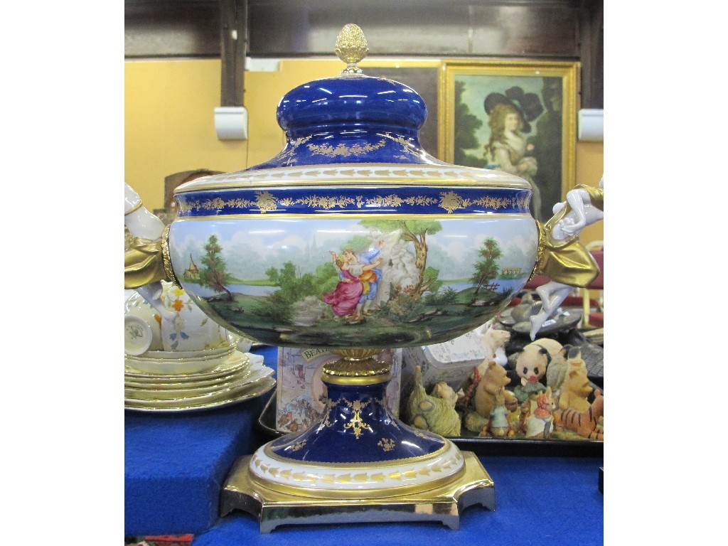 Appraisal: Italian porcelain urn and cover with figural handles lid def