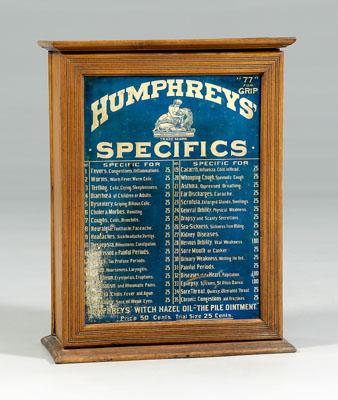 Appraisal: Humphreys Specifics cabinet oak interior with drawers identical front and