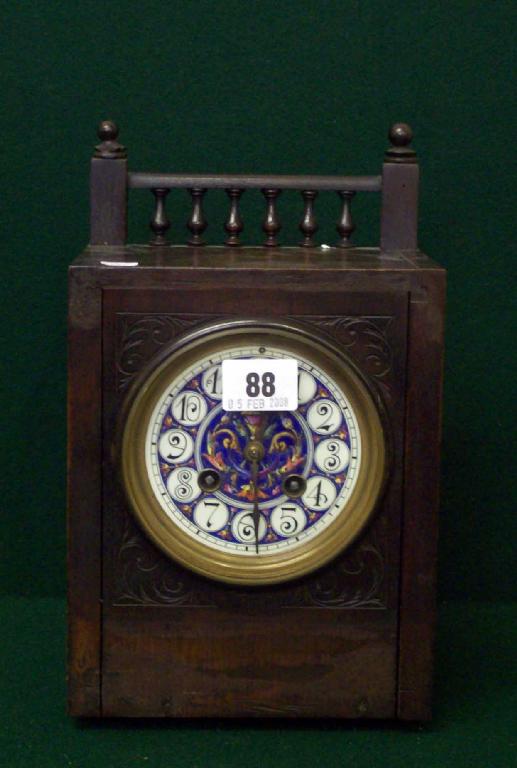 Appraisal: An aesthetic design mantel clock with decorative enamel face key