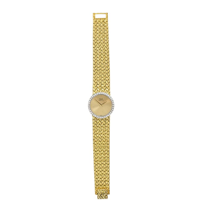 Appraisal: PIAGET LADIES K GOLD DIAMOND WATCH Circular gold face with