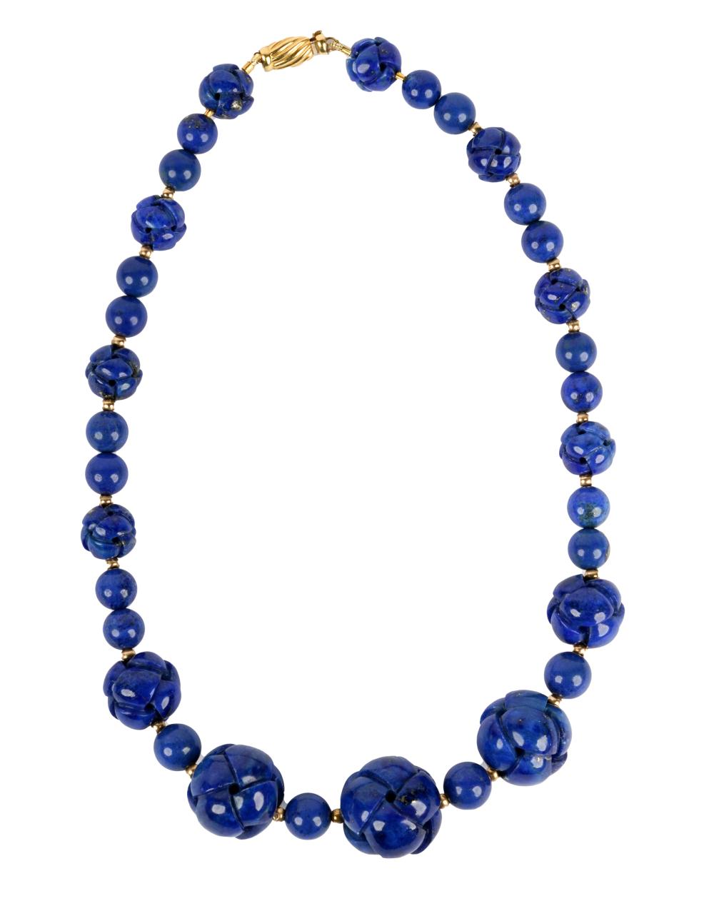 Appraisal: KARAT YELLOW GOLD CARVED LAPIS LAZULI NECKLACEcontaining round carved and