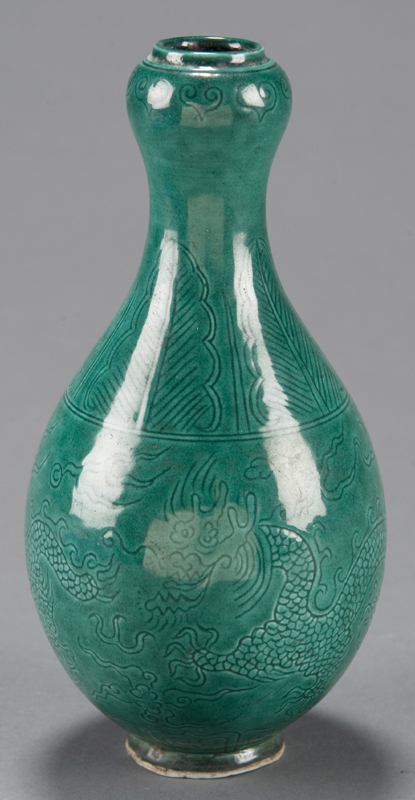 Appraisal: Chinese porcelain green glazed bottle vase th century Having a