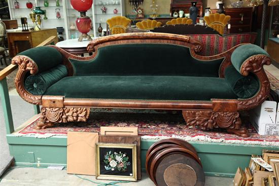 Appraisal: EMPIRE STYLE SOFA Walnut with flame grain accents carved foliate