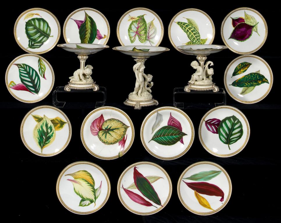 Appraisal: A ROYAL WORCESTER 'JEWELLED' DESSERT SERVICE painted with large detailed