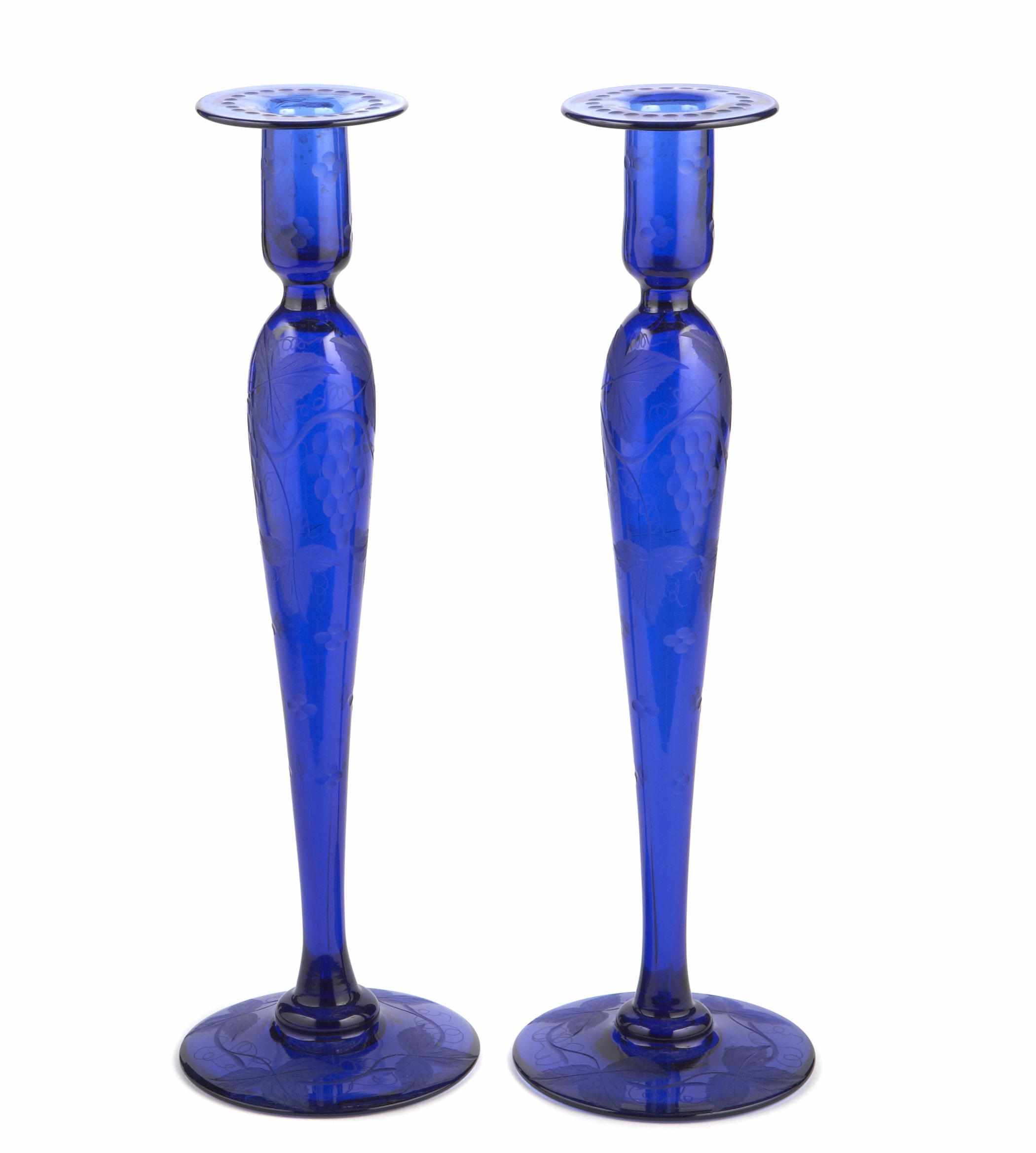 Appraisal: A pair of engraved blue glass candle holders height in