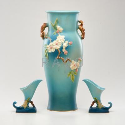 Appraisal: ROSEVILLE Two-handled Apple Blossom vase and pair of cornucopia Zanesville