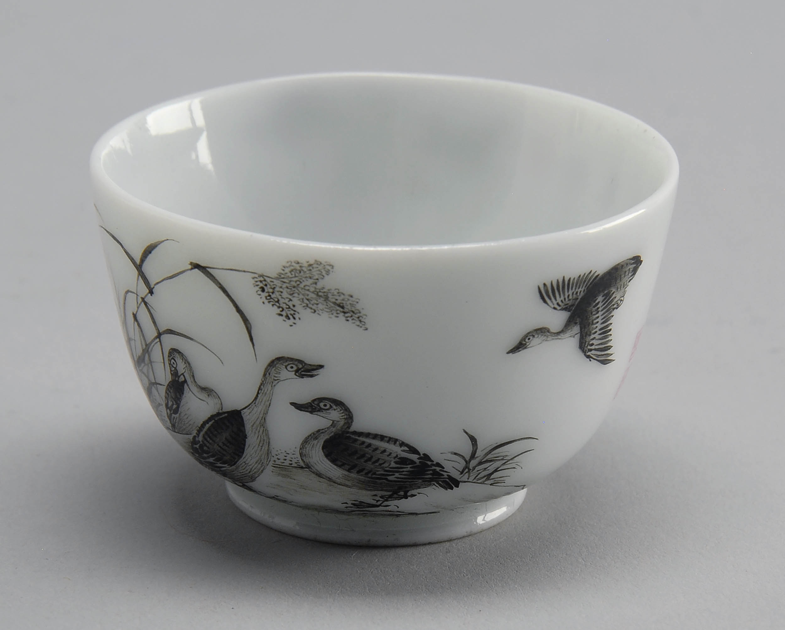 Appraisal: PORCELAIN WINE CUP With grisaille goose and marsh grass design