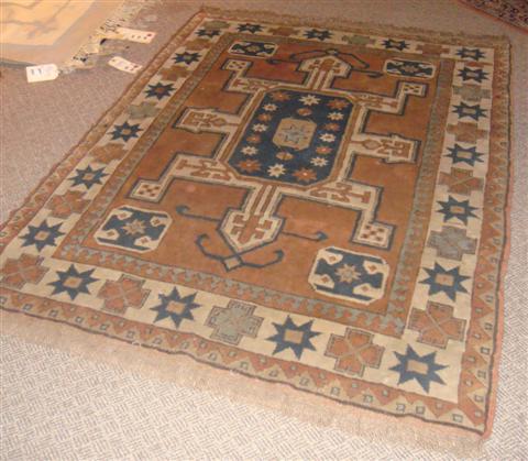 Appraisal: CAUCASIAN- TRIBAL BLUE ROSE AND CREAM RUG x Feet Provenance