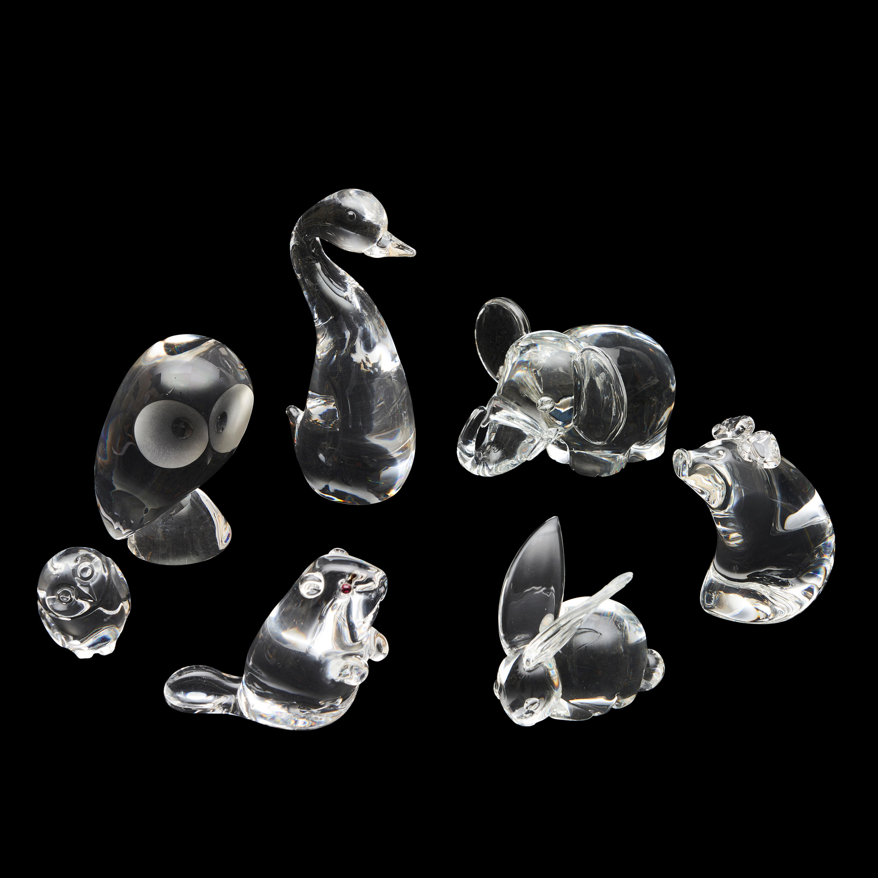 Appraisal: SEVEN STEUBEN COLORLESS GLASS ANIMALS including an elephant a goose