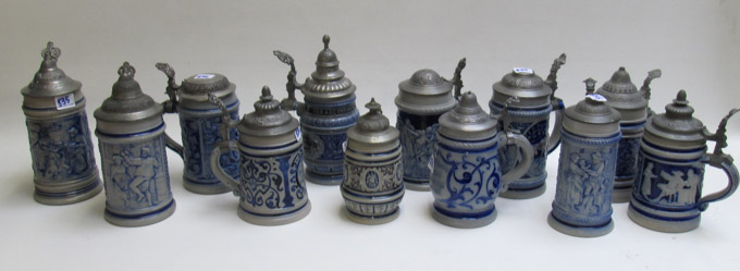 Appraisal: COLLECTION OF TWELVE BEER STEINS all are relief stoneware type