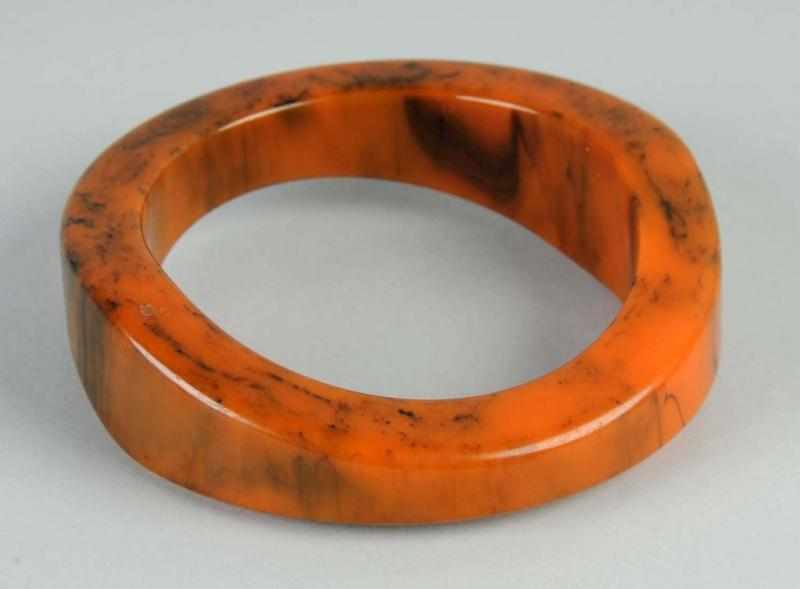 Appraisal: Bakelite Marbelized Brown Bangle Description Unusually shaped bracelet No damage