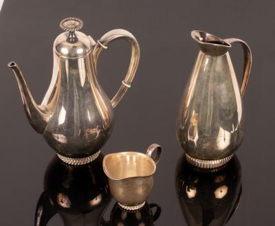 Appraisal: A German silver coffee pot standard of pear-shape with ropetwist