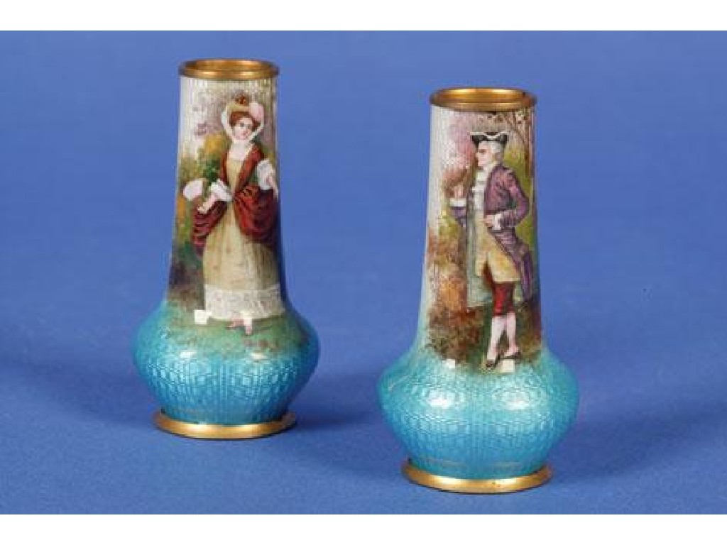 Appraisal: A PAIR OF AUSTRIAN MINIATURE BLUE ENAMEL VASES of shouldered