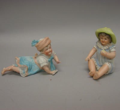 Appraisal: Pair of bisque piano baby type figurines of little girls