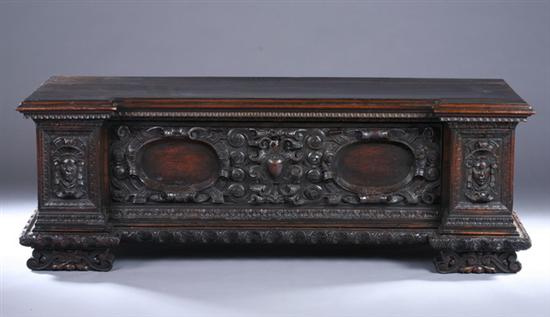 Appraisal: CONTINENTAL CARVED WALNUT CASSONE th century with later front panel