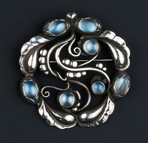 Appraisal: Georg Jensen'Moonlight' silver and moonstone broochwith a bud and leaf