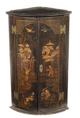 Appraisal: An th century black lacquer bowfront hanging corner cupboard the