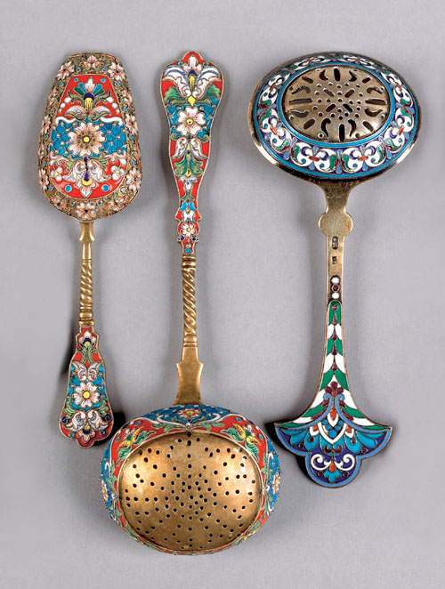 Appraisal: Russian silver gilt and enamel tea strainer and caddy spoon