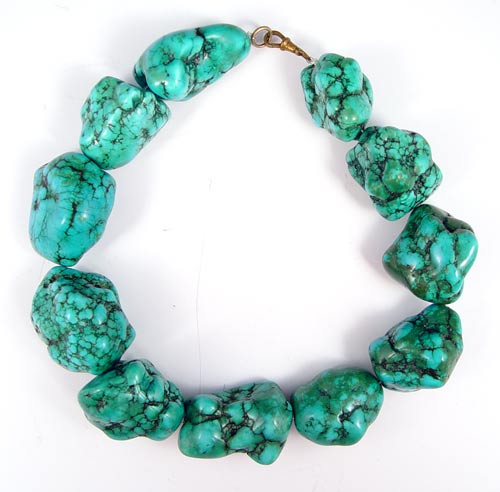 Appraisal: STRAND NECKLACE OF LARGE TURQUOISE NUGGETS '' long strand of