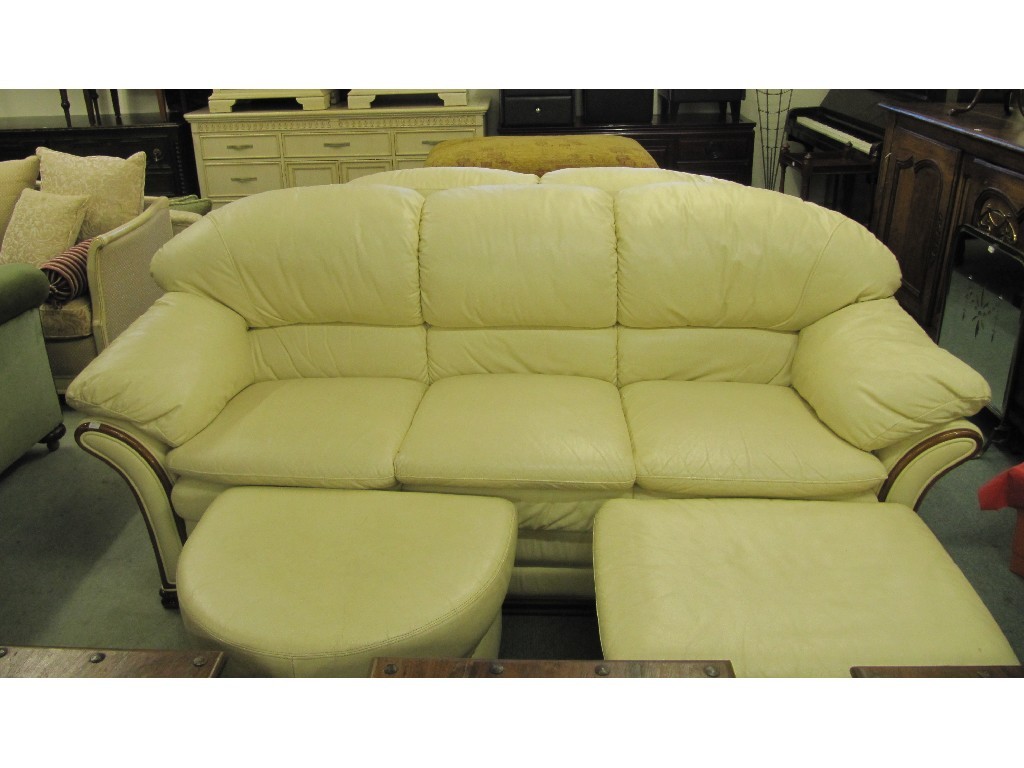 Appraisal: Matching cream leather three seater and two seater settee with