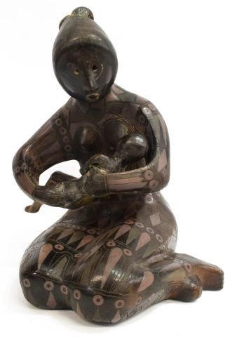 Appraisal: Blackware pottery sculpture Kneeling Mother with Child signed on left