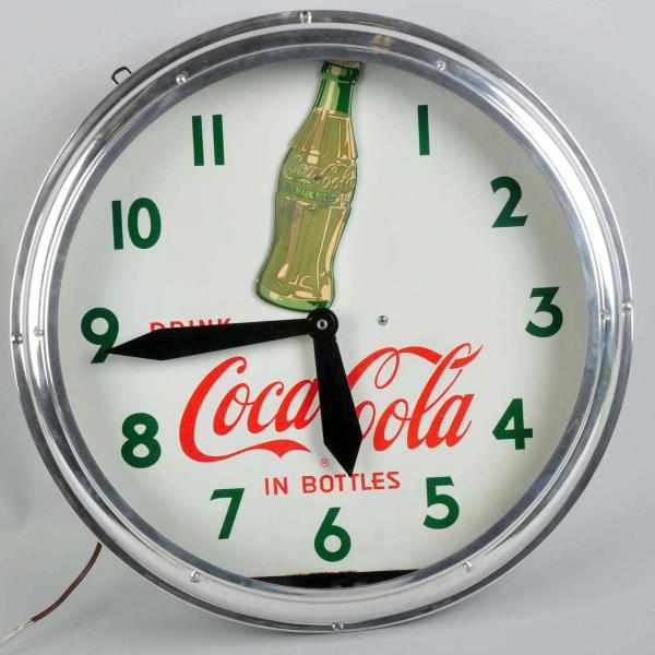 Appraisal: Coca-Cola Rocking Bottle Neon Clock Circa Displays very well Clock