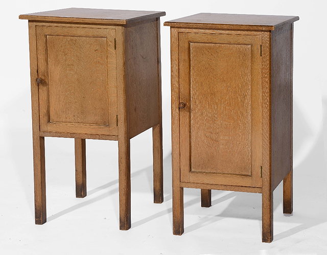 Appraisal: Two similar Heals oak bedside cupboardscirca s each door with